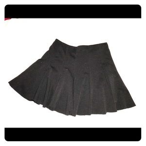 Black pleated circle skirt